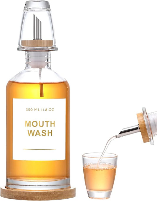 11.8OZ Glass Mouthwash Dispenser for Bathroom with Stainless Steel & Bamboo Nozzle, Mouthwash Cup Reusable, Bamboo Tray, and Elegant Gold Sticker.（Clear