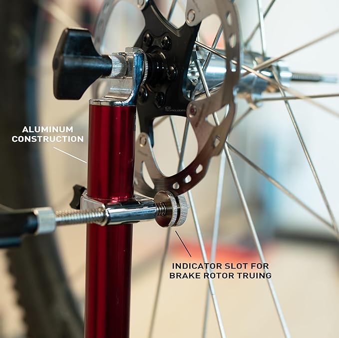 FEEDBACK SPORTS | Pro Truing Stand with Thru Axle Adapter | Compact and Portable Lightweight Aluminum | Integrates With Repair Stand | Precision Spring-Loaded Tip Verifies Lateral True-StrideForce Fitness