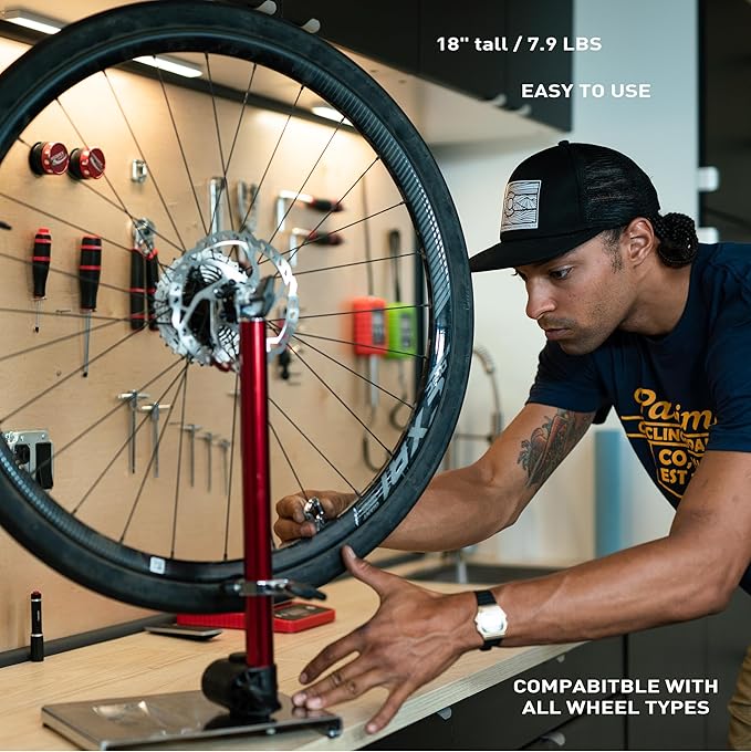 FEEDBACK SPORTS | Pro Truing Stand with Thru Axle Adapter | Compact and Portable Lightweight Aluminum | Integrates With Repair Stand | Precision Spring-Loaded Tip Verifies Lateral True-StrideForce Fitness